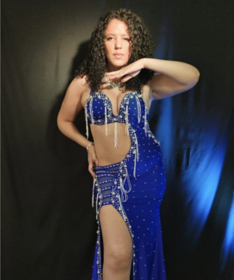 Marcelly in a blue and silver belly dance costume
